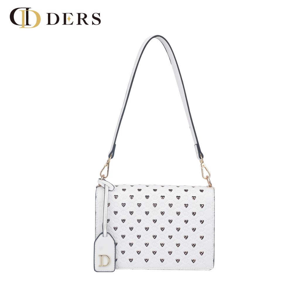 Customizable embossed logo PU ladies bag with laser perforated and hot-pressing studs