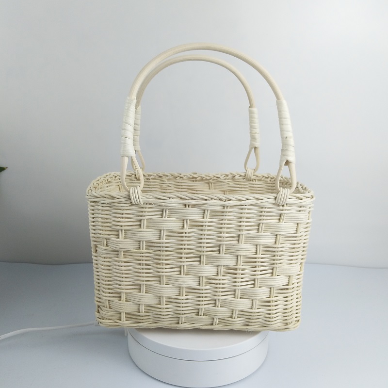 White vines weave baskets of flowers