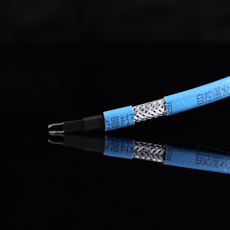 Self regulating heating cable