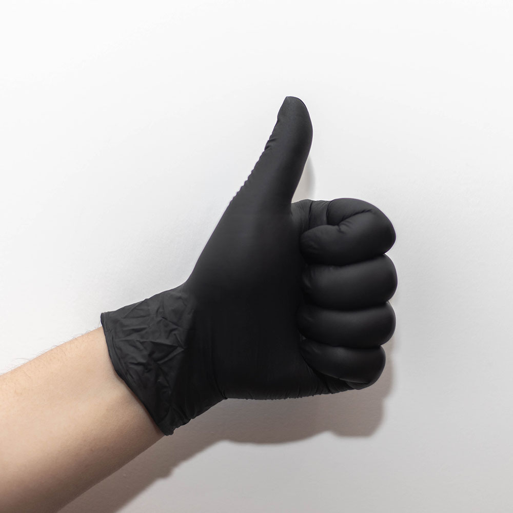 Disposable vinyl glove black color