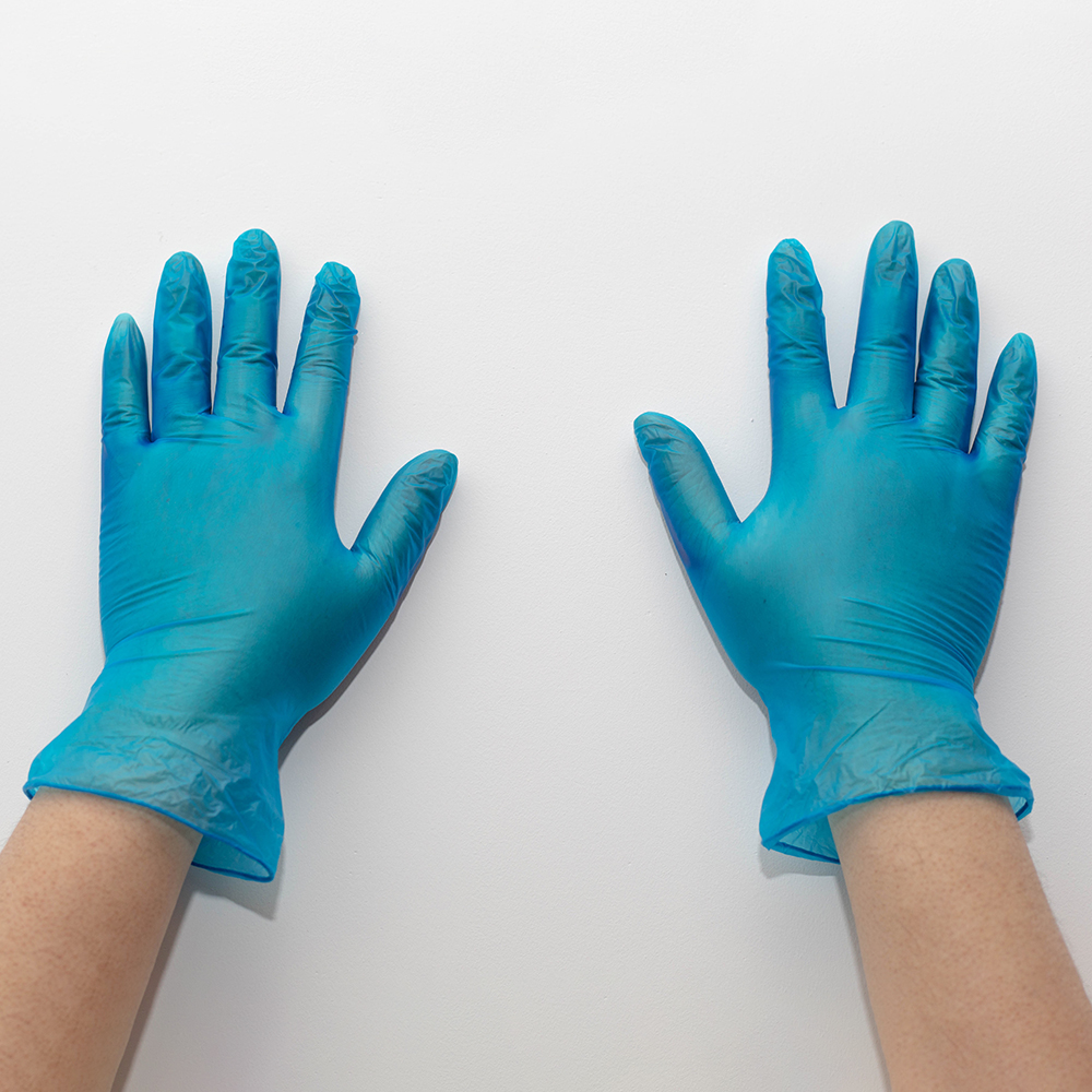 Disposable vinyl glove blue color