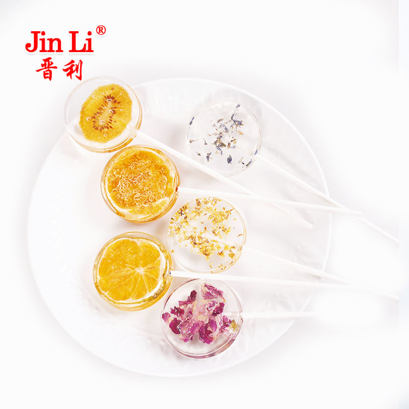 Circle shaped candy lollipop flower or dried fruit