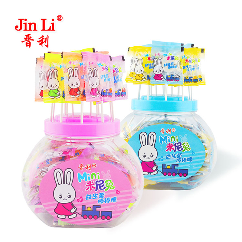Milk flavored lollipop candy with probiotics