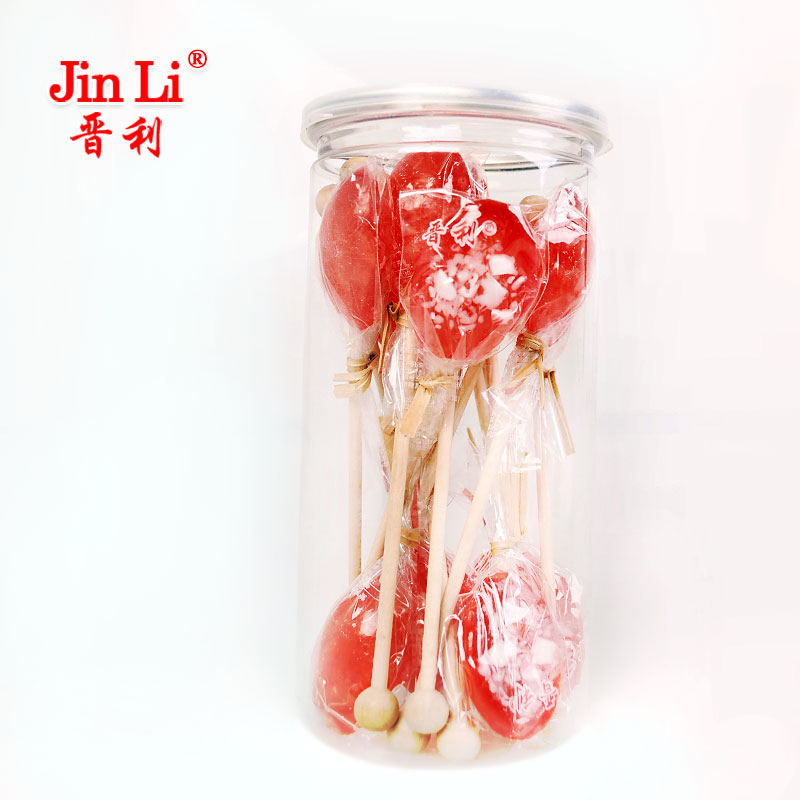 Wooden stick colorful spoon shaped candy lollipop with sugar crush