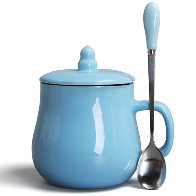 Light blue ceramic cup with spoon and cover