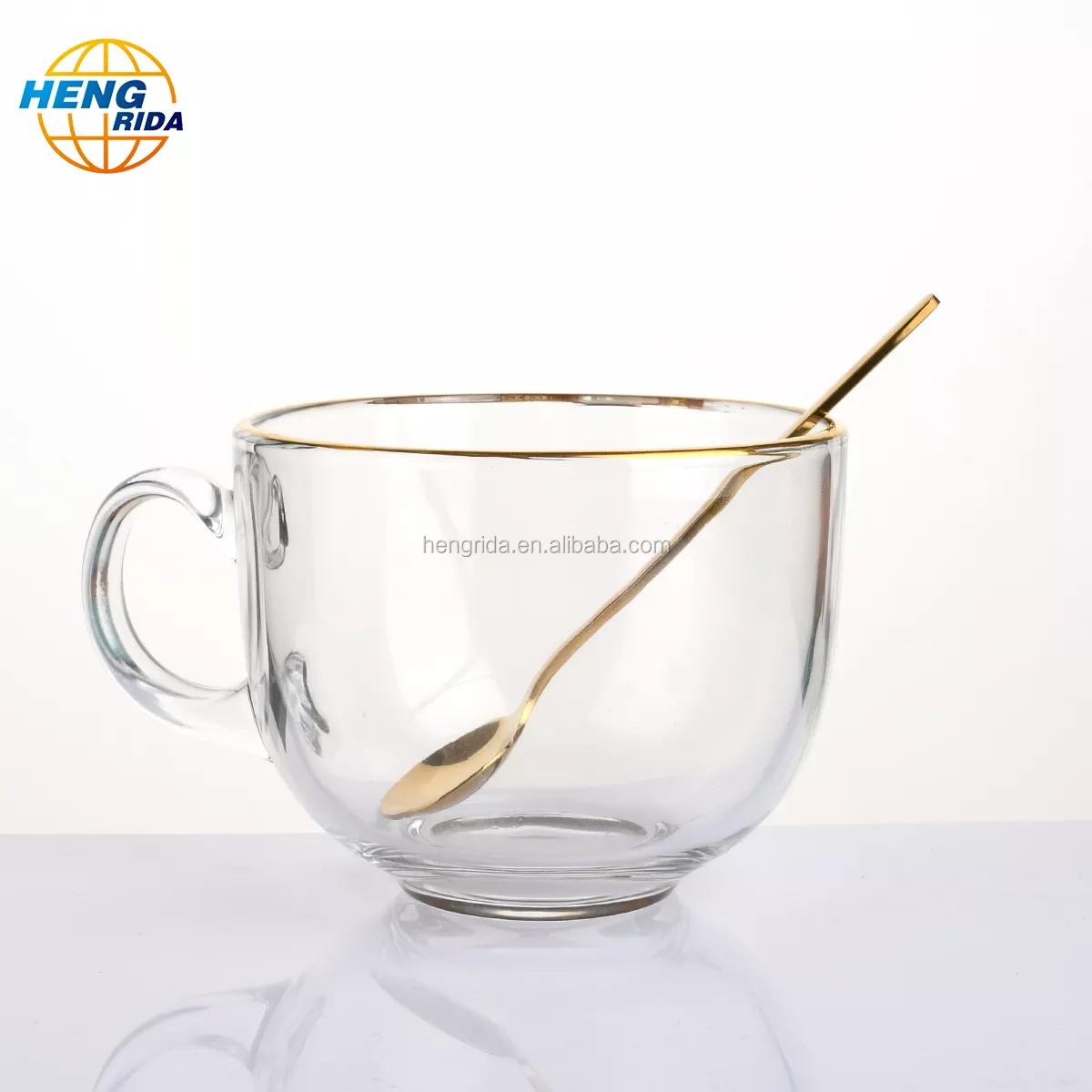 Wide-mouth painted gold rimmed glass cup with handle
