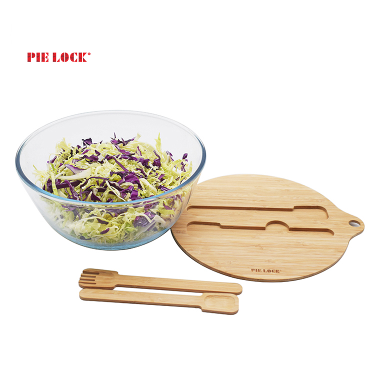 Glass salad bowl with bamboo lid spork