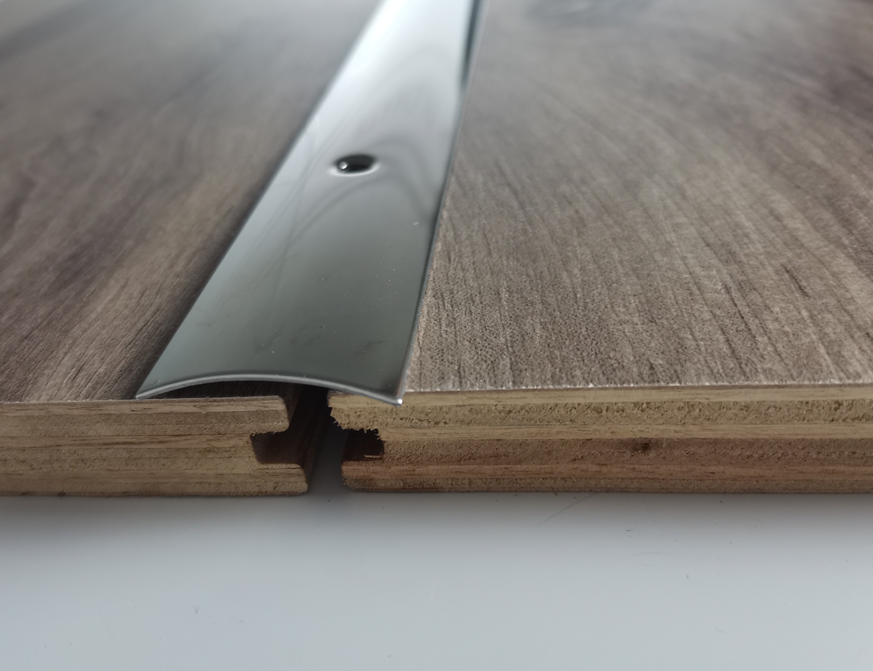 Stainless steel floor batten door edge strip