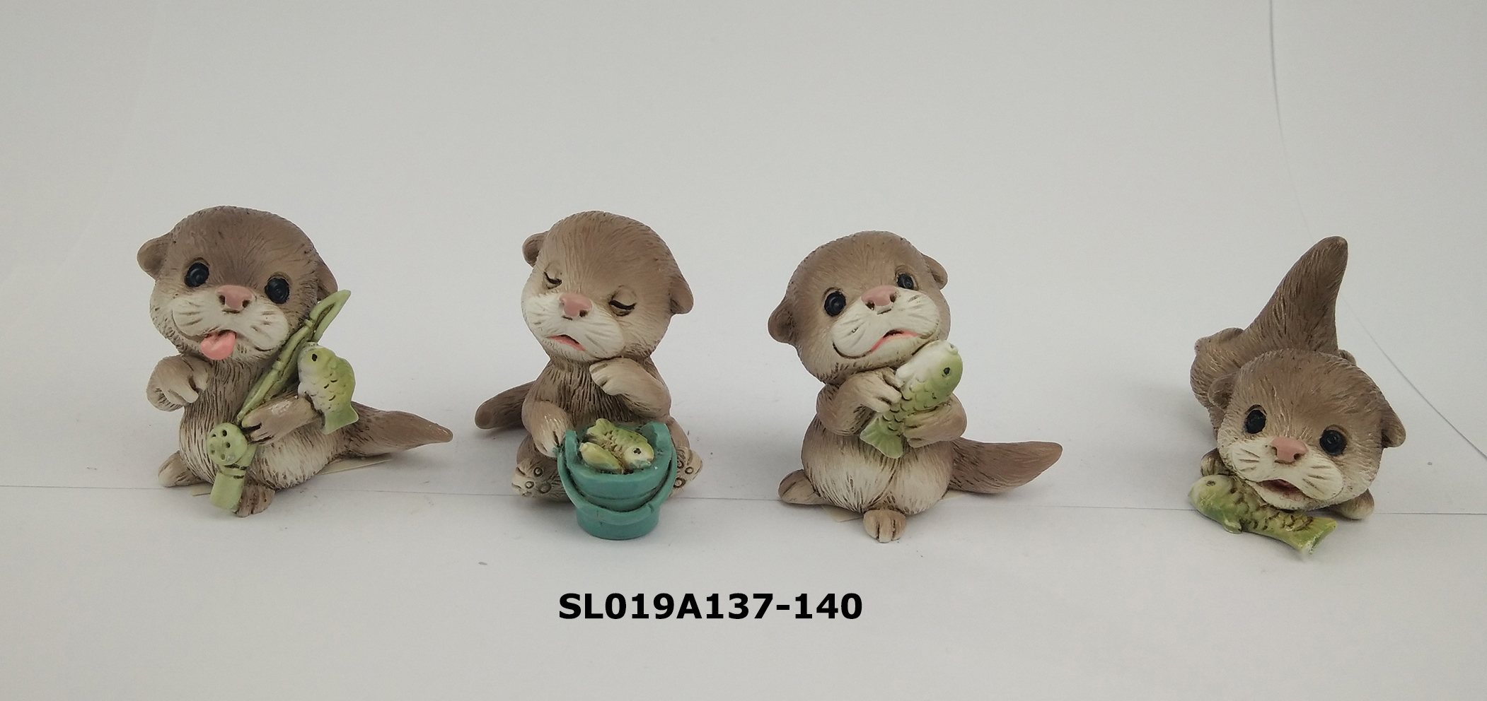 Resin trinket, key chain - animal-otters