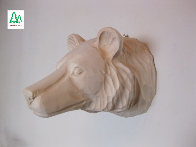 wooden carved animal head