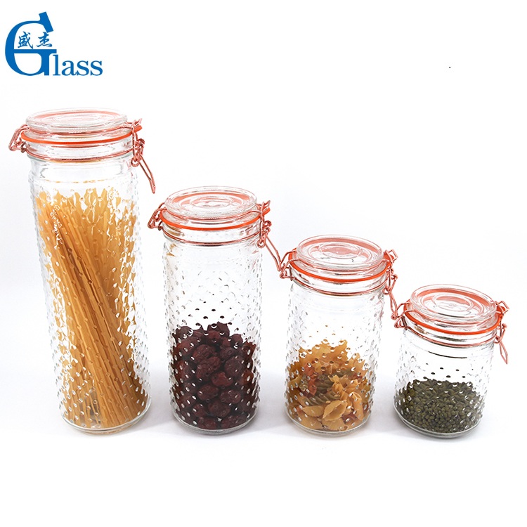 Wholesale Embossed Clear Glass Airtight Jar With Metal Locking Glass Lid
